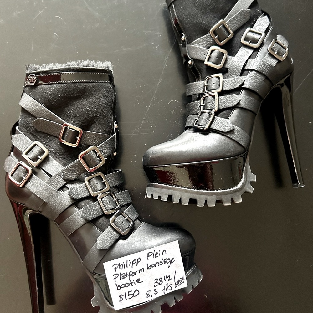 PRICE DROP platform furry lining bondage bootie. run small! I wear 61/2 -7 US